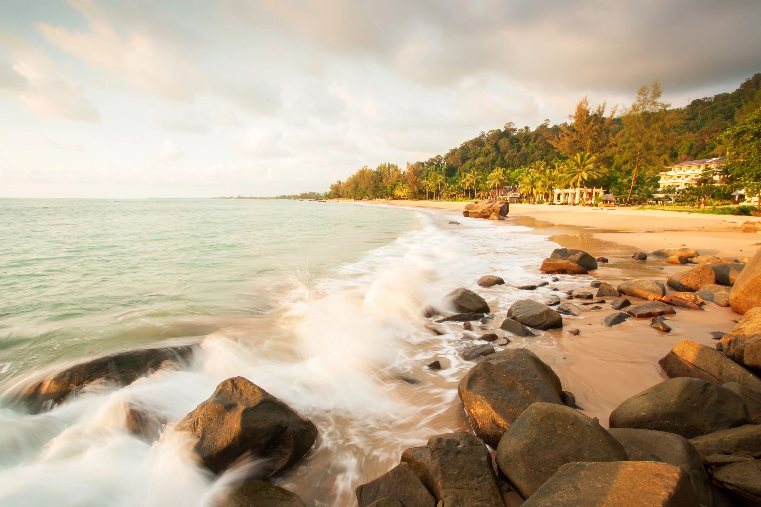Khao Lak beach at dusk with calm waves