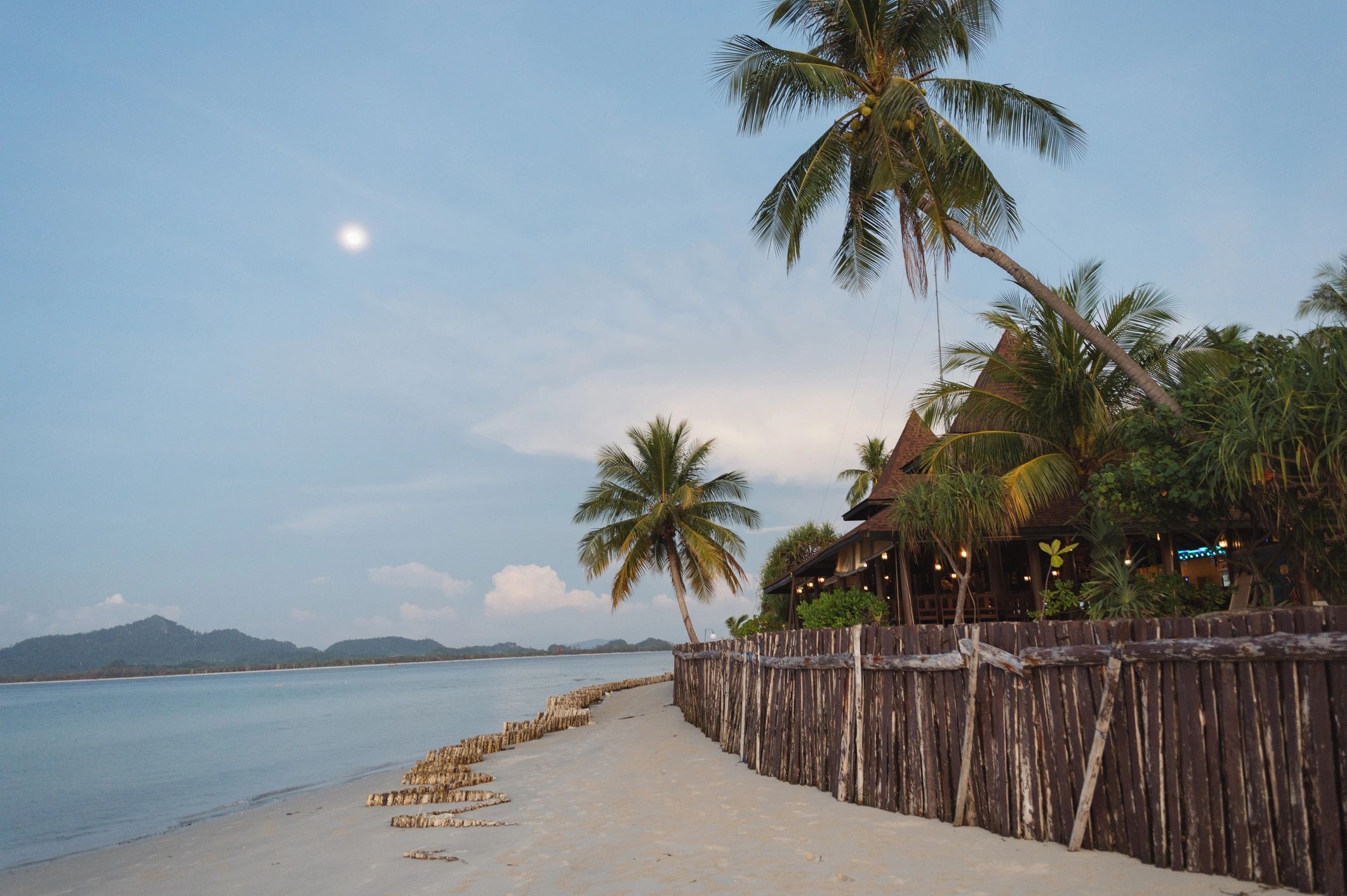 Blue tropical beach scene used as a testimonial avatar image