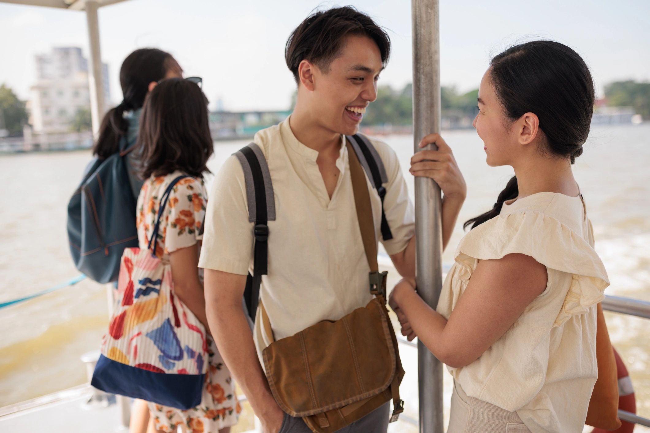 Couple enjoying a boat tour in Thailand