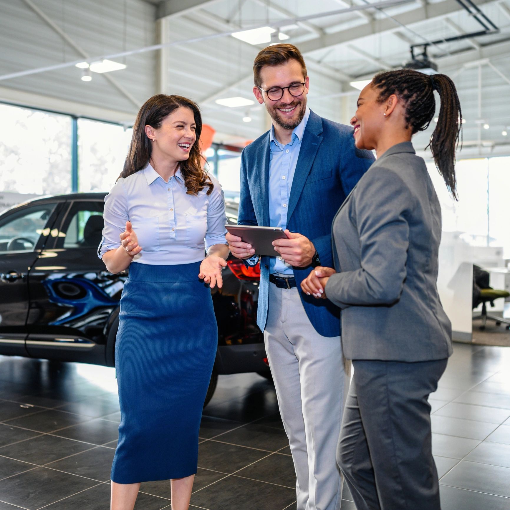 Guests talking with a concierge