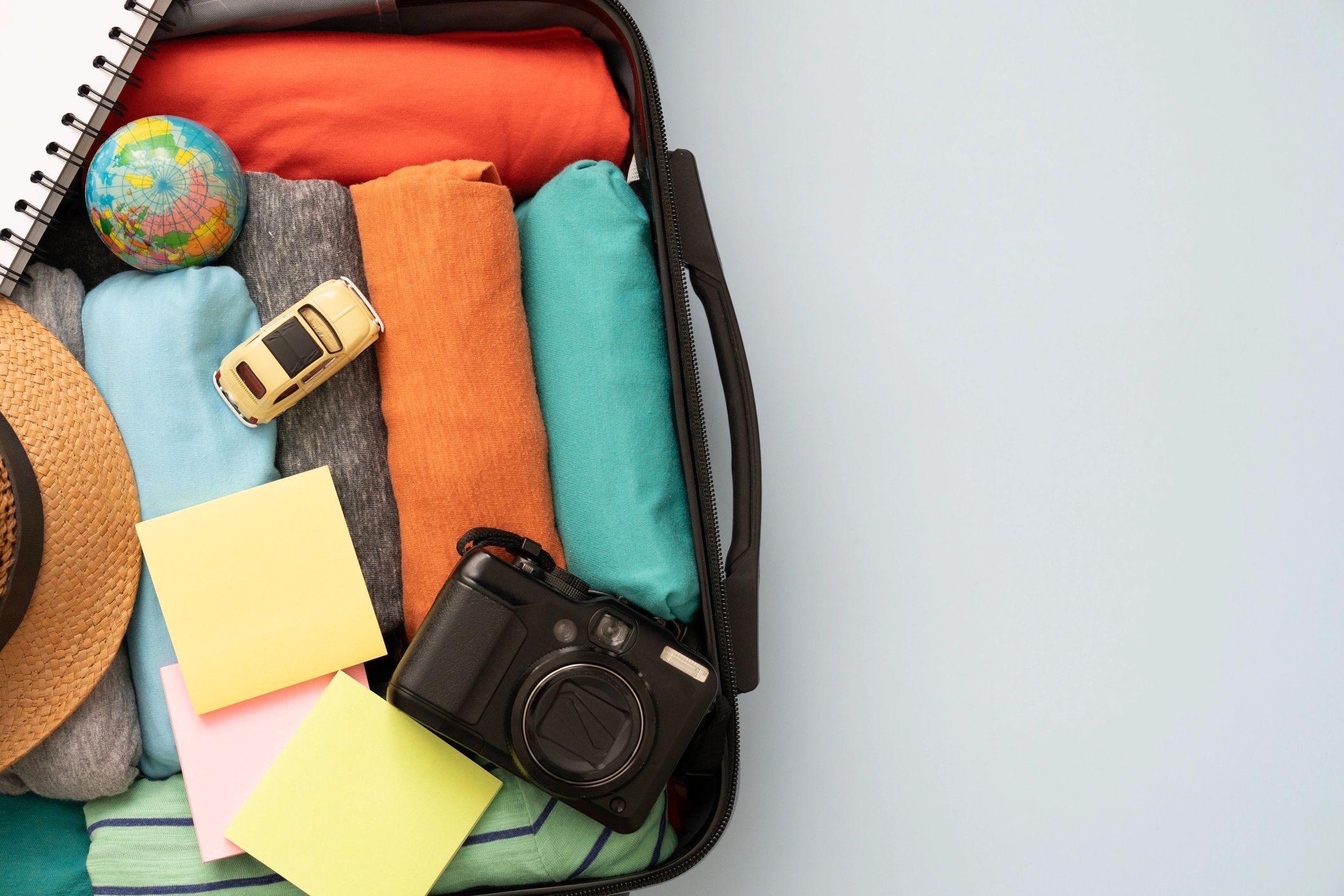Travel planning with luggage and map